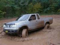 Nissan Frontier - silver nissan