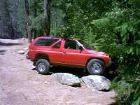 Nissan Pathfinder - on a rock