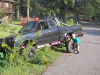 Nissan  - son with truck in ditch