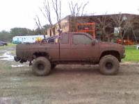 Nissan Hardbody - 97 after mudding